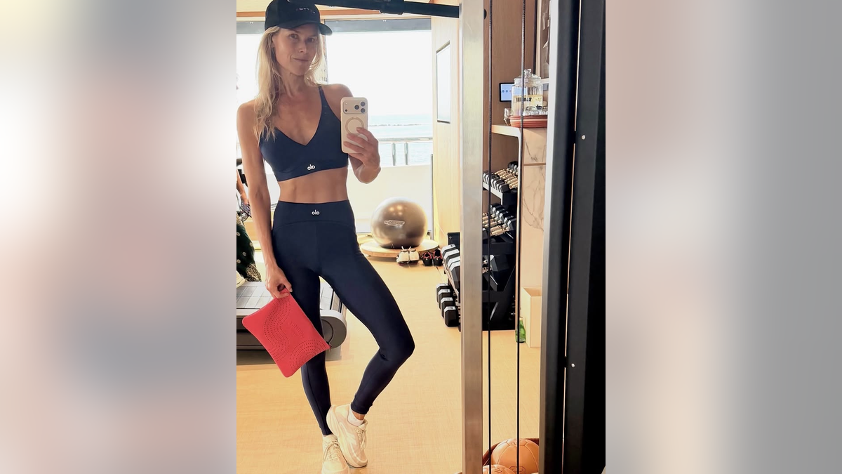 Ali Larter in the gym on yacht
