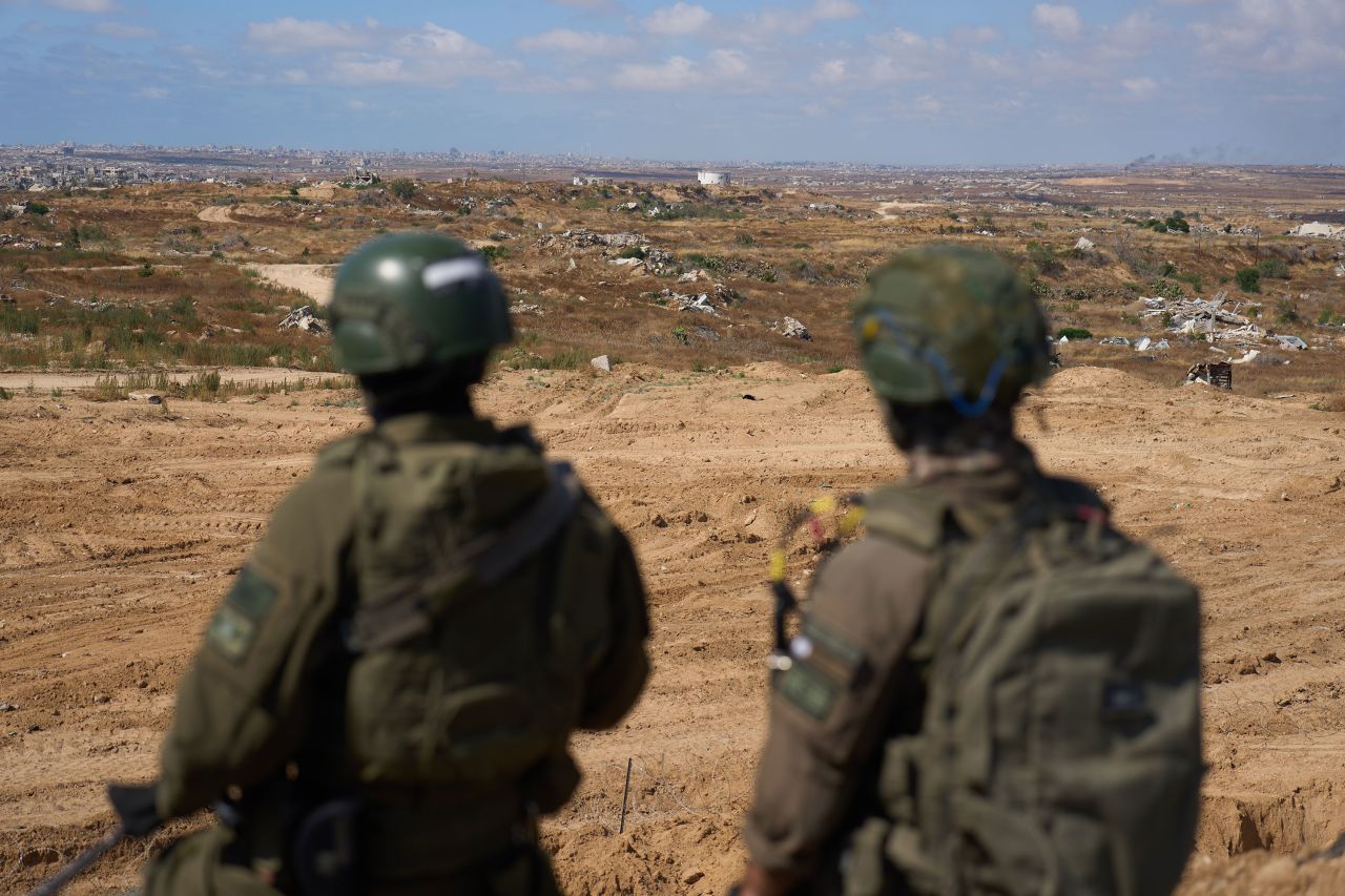 Israeli soldiers occupy a military position overlooking the "yellow line" in Gaza on May 26.