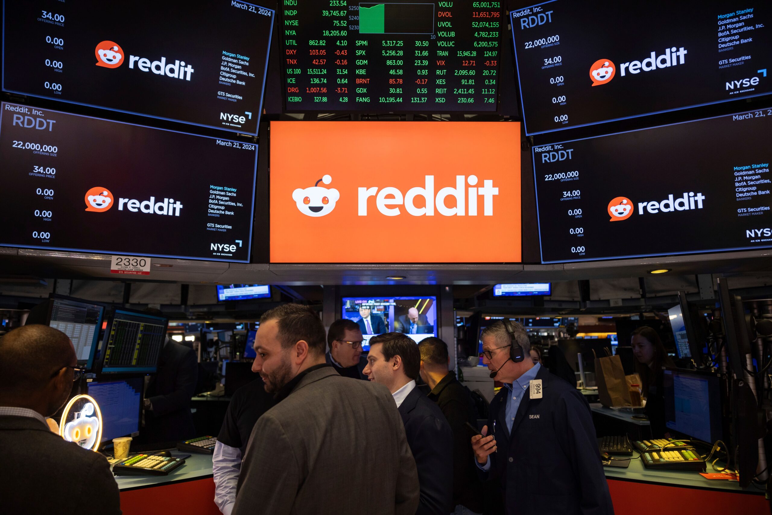 FILE - Reddit Inc. logos are displayed on the New York Stock Exchange trading floor, prior to the company's IPO, Thursday, March. 21, 2024.