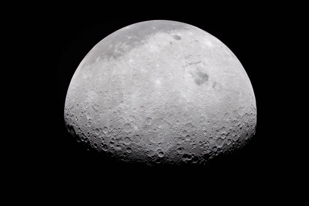The Moon’s rocky, uneven, and otherworldly surface features are highlighted by the terminator – the difference between light and darkness.