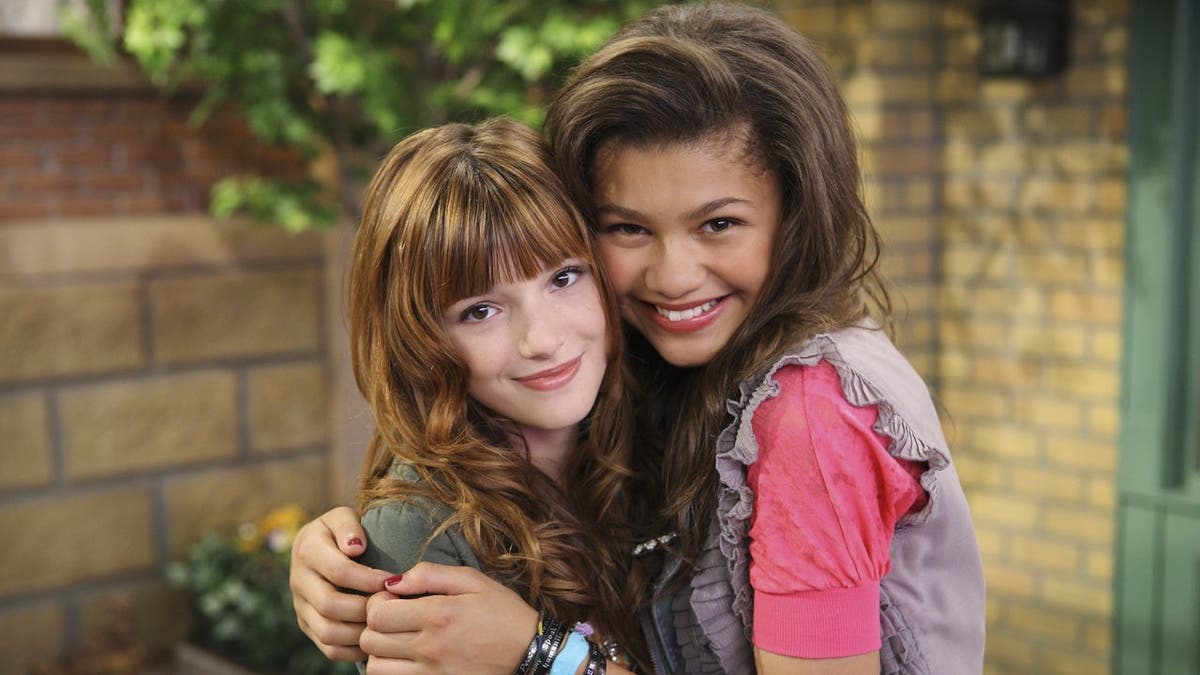 Bella Thorne and Zendaya stand together on the set of Disney Channel's Shake It Up.