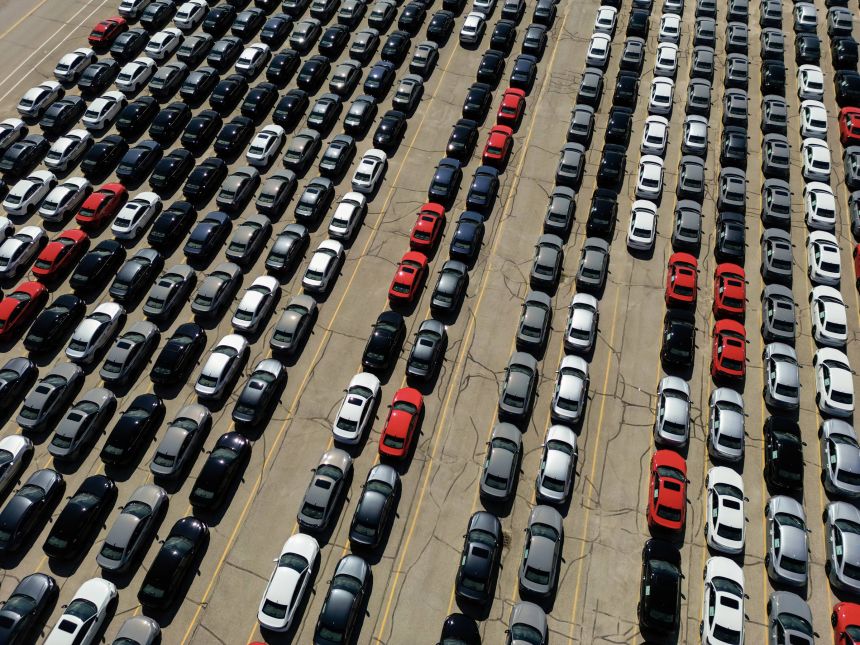 Cars are parked at a Manufacturing facility in Alliston, Ontario, on August 19, 2026.