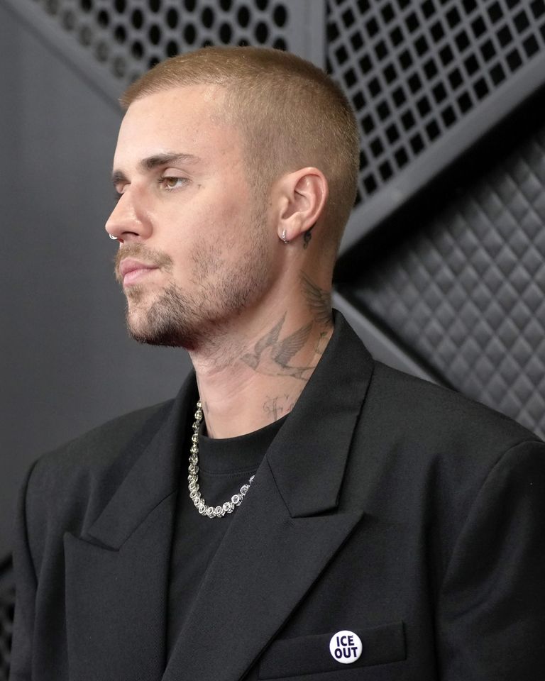 Justin Bieber’s peach tattoo, on his neck near the collar, pictured at the 2026 GRAMMY Awards.Credit: Jeff Kravitz/FilmMagic