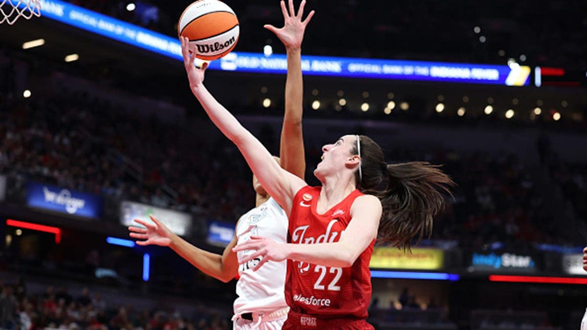 Caitlin Clark shoots the ball against the Las Vegas Aces at Gainbridge Fieldhouse.