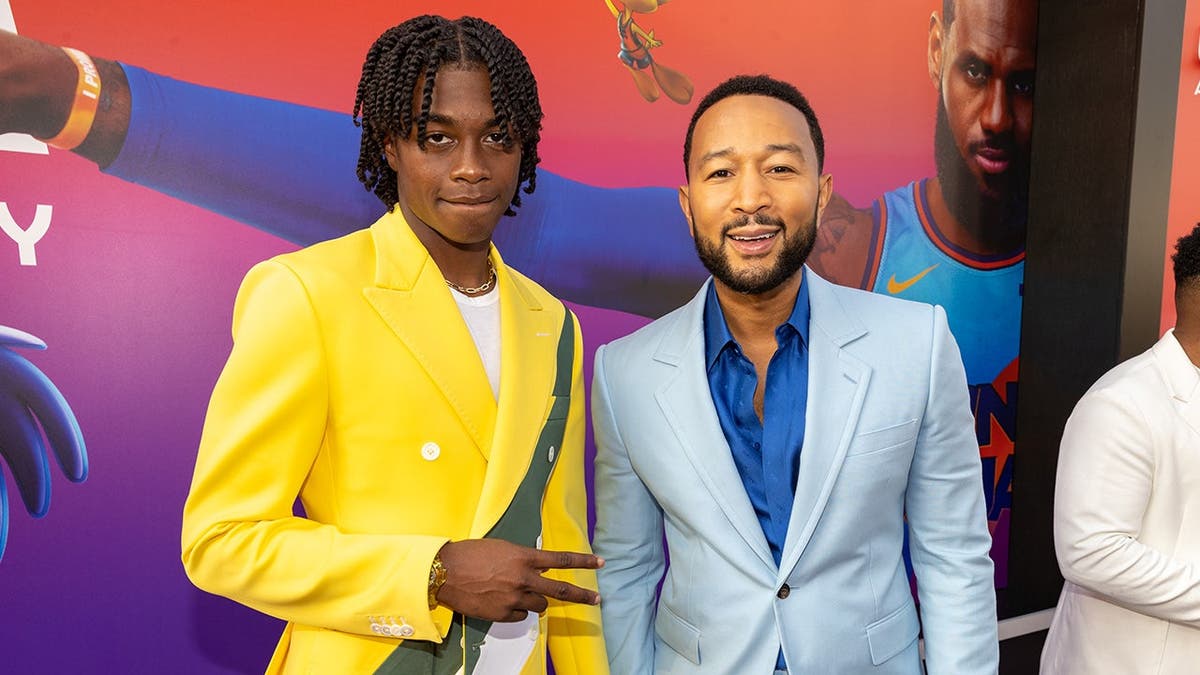 Ceyair Wright and John Legend stand together at a film premiere.