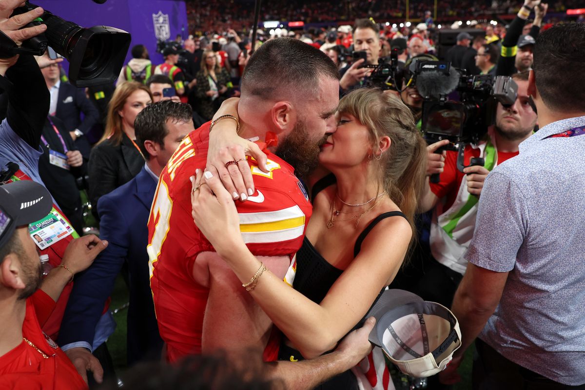 The Kansas City Chiefs kisses Taylor Swift after defeating the San Francisco 49ers 25-22 at Super Bowl LVIII