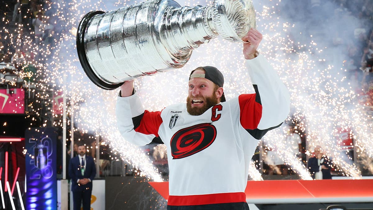 Eric Staal lifting Stanley Cup