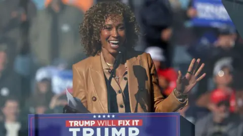 Getty Images Television anchor Sage Steele takes the stage during a Republican presidential nominee, former U.S. President Donald Trump campaign rally at Lancaster Airport on November 03, 2024 in Lititz, Pennsylvania.