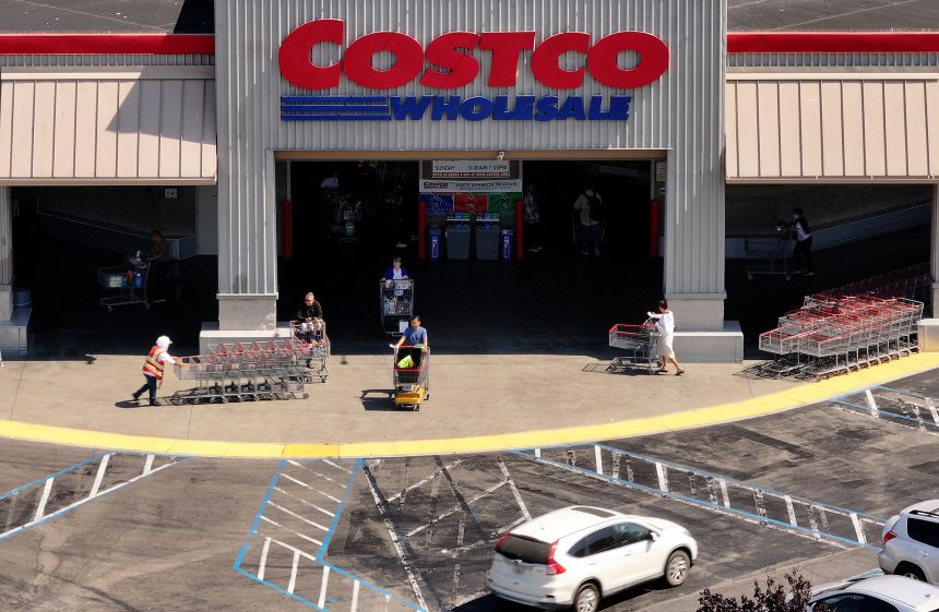 In an aerial view, the Costco logo is displayed on the exterior of a Costco store on July 11, 2024 in Richmond, California.
