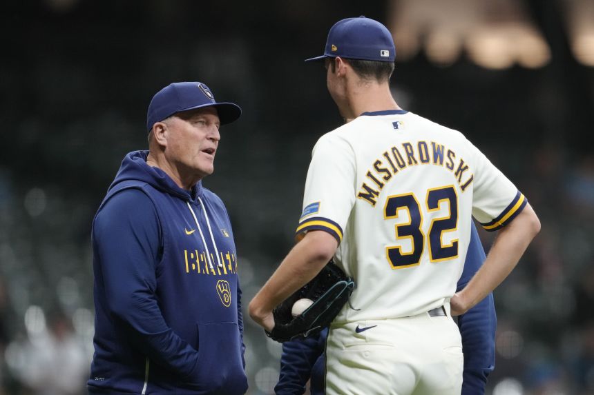 Manager Pat Murphy of the Milwaukee Brewers talks with Jacob Misiorowski in May.