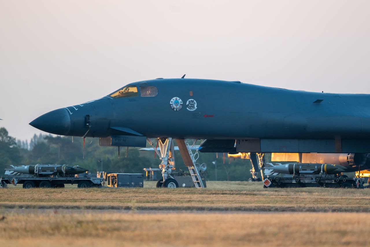Munitions are seen near a B1 Bomber at the Royal Air Force Fairford station on July 25 in Fairford, England. The US Air Force has used the station to launch defensive bombing missions against Iranian military targets.