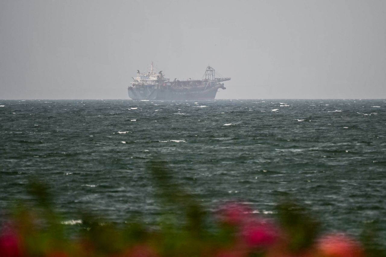 A vessel is seen off the coast of Sharjah in the United Arab Emirates on August 3, 2026. (Photo by AFP via Getty Images) /