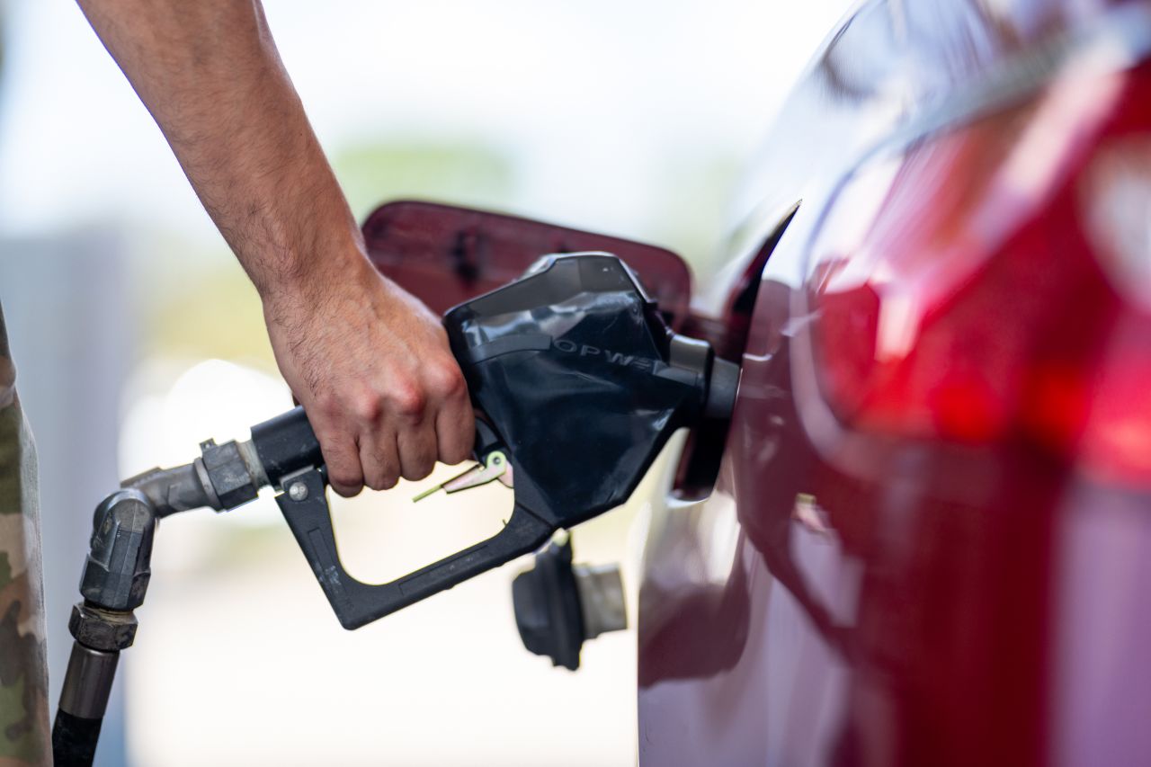 A person pumps gas at a Chevron gas station on August 7, in Austin, Texas.