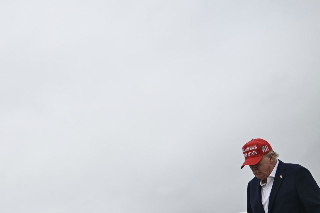 Donald Trump steps off Air Force One upon arrival at Joint Base Andrews in Maryland on August 16.