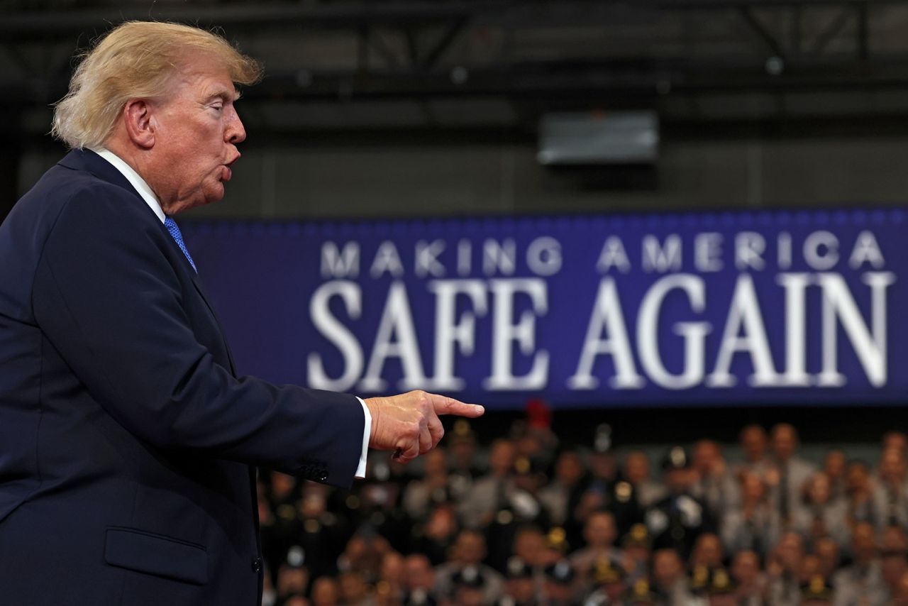 President Donald Trump departs after delivering remarks at the David S. Mack Center for Training and Intelligence in Garden City, New York, on Friday.