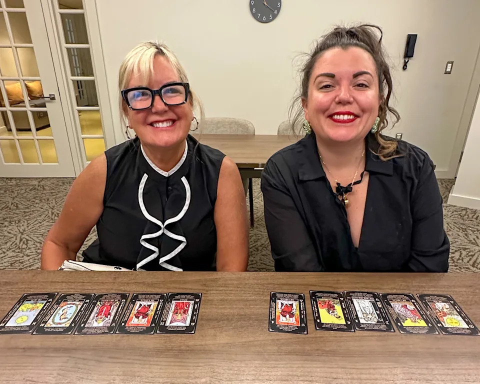 Woman and daughter with tarot cards