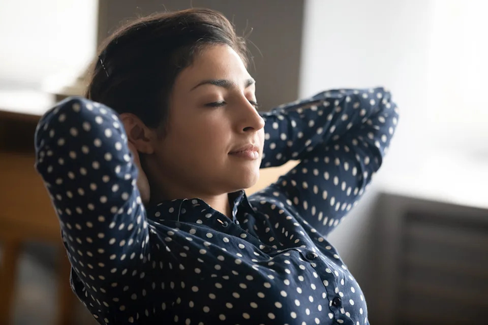 Glass of water and a calm still moment, illustrating wellness stacking as an antidote to burnout