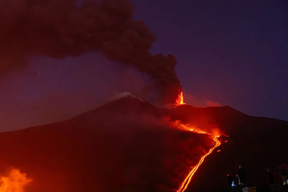 Eruptive activity continues on Mount Etna, where lava flows continue to descend on the slopes of the volcano. (is associated with: «Catania airport stays shut as Etna eruption mars peak summer travel») Tommaso Sfregola/JNA via ZUMA Press Wire/dpa