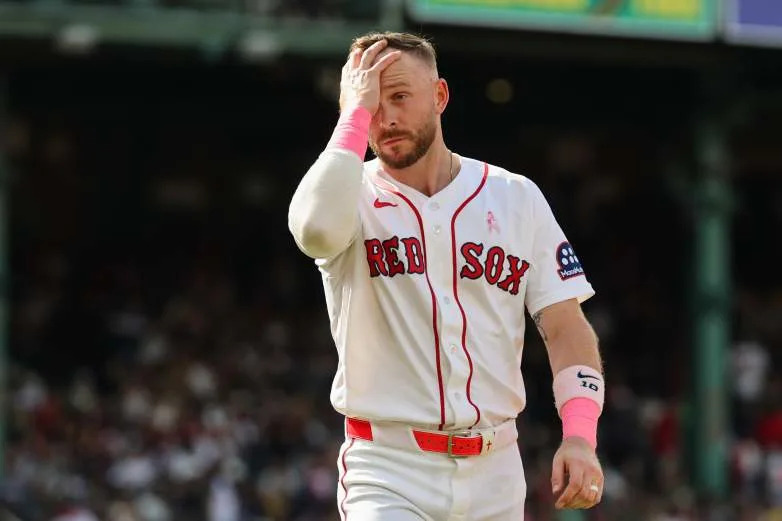 BOSTON, MA - MAY 10: Trevor Story #10 of the Boston Red Sox reacts after striking out to end the eighth inning against the Tampa Bay Rays at Fenway Park on May 10, 2026 in Boston, Massachusetts. (Photo By Winslow Townson/Getty Images)