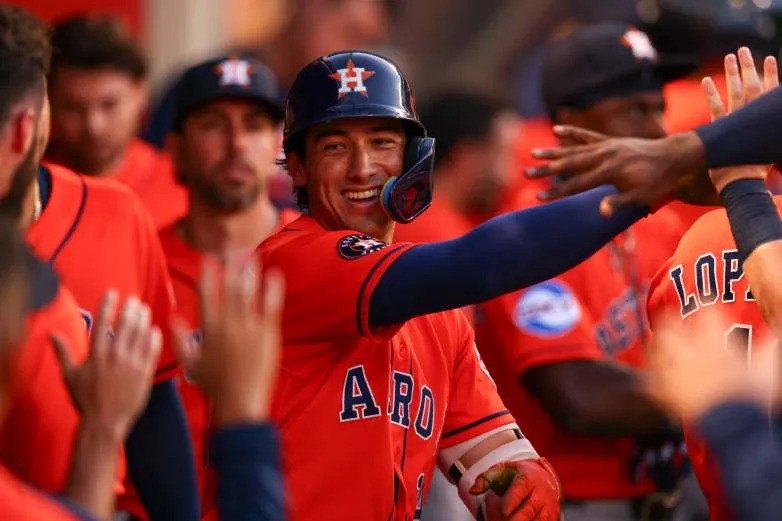 ANAHEIM, CALIFORNIA - JUNE 10: Shay Whitcomb #14 of the Houston Astros celebrates in the dugout with teammates after hitting a home run during the sixth inning against the Los Angeles Angels at Angel Stadium of Anaheim on June 10, 2026 in Anaheim, California. (Photo by Melina Pizano/Getty Images)