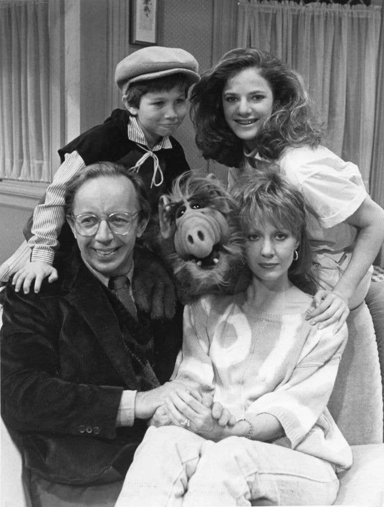 Max Wright, Benji Gregory, Andrea Elson, and Anne Shedeen with ALF aka Alien Life Form in still from the TV show "ALF" on May 23, 1986 in Los Angeles, California.
