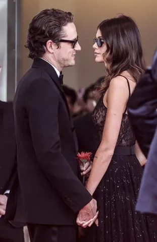 Kaia Gerber and Lewis Pullman holding hands at 'The Testament of Ann Lee' at the 2025 Venice Film FestivalCredit: Alessandra Benedetti - Corbis/Corbis via Getty