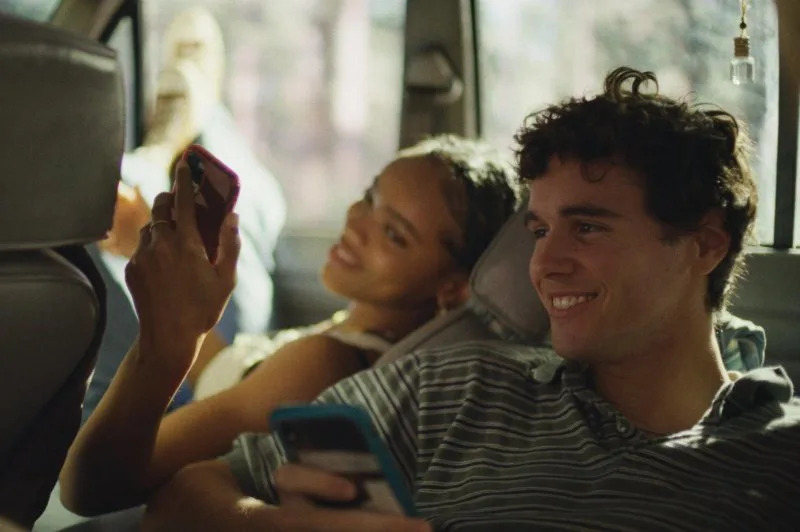 Akira Jackson and Noah Toth ride in the backseat in "It Ends," in theaters Friday. Photo courtesy of Neon