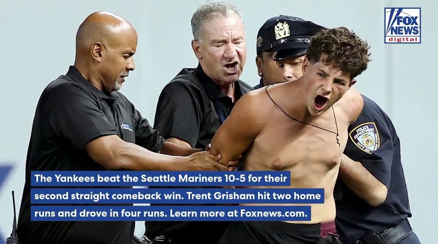 MLB game delayed after fans storm field, get laid out by security