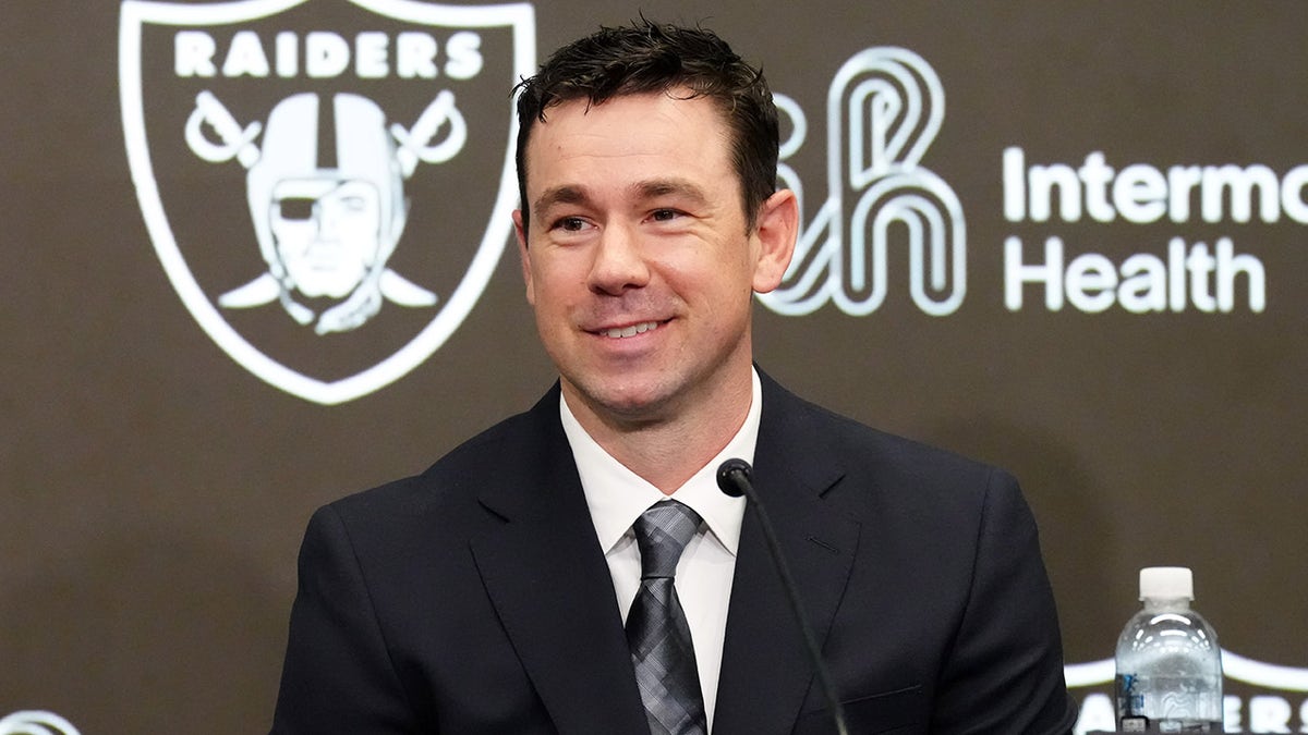 Klint Kubiak speaks at a press conference