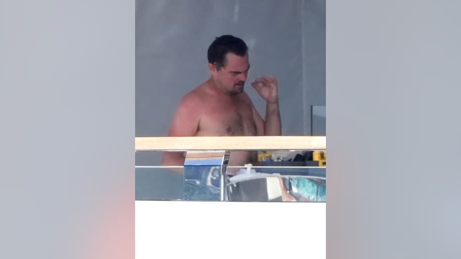 Leonardo DiCaprio, Vittoria Ceretti, and Laura Harrier on a luxury yacht off Saint-Tropez, France.