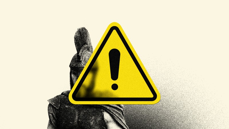Matt Damon in "The Odyssey," covered up by a warning sign