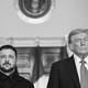 A black-and-white image of President Trump standing next to President Zelensky, both looking stoic