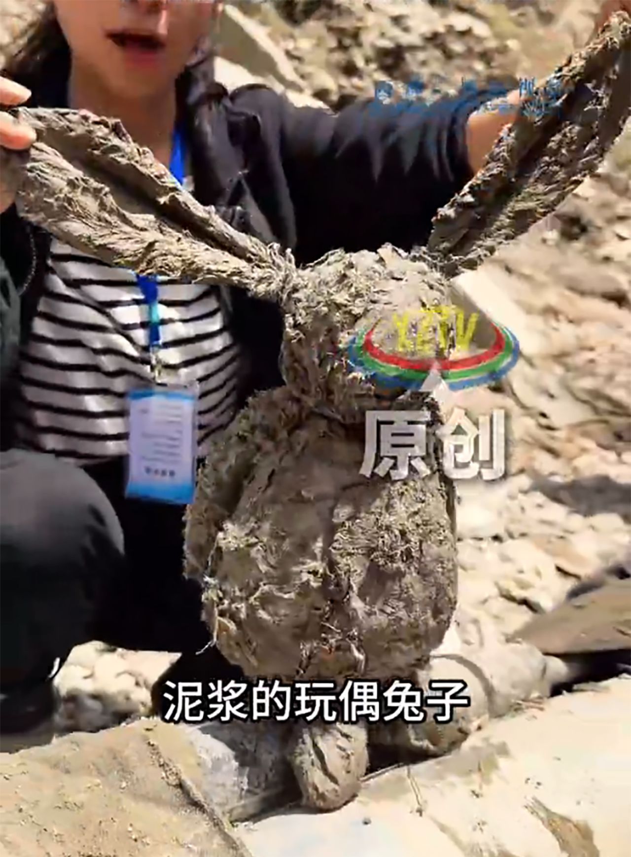 A rabbit soft toy covered in mud was found following flooding in Nepal.
