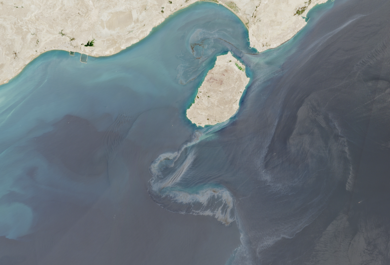 Satellite imagery taken on August 10 appeared to show large oil slicks off the coast of Iran's Qeshm and Hengam Island near the Strait of Hormuz.