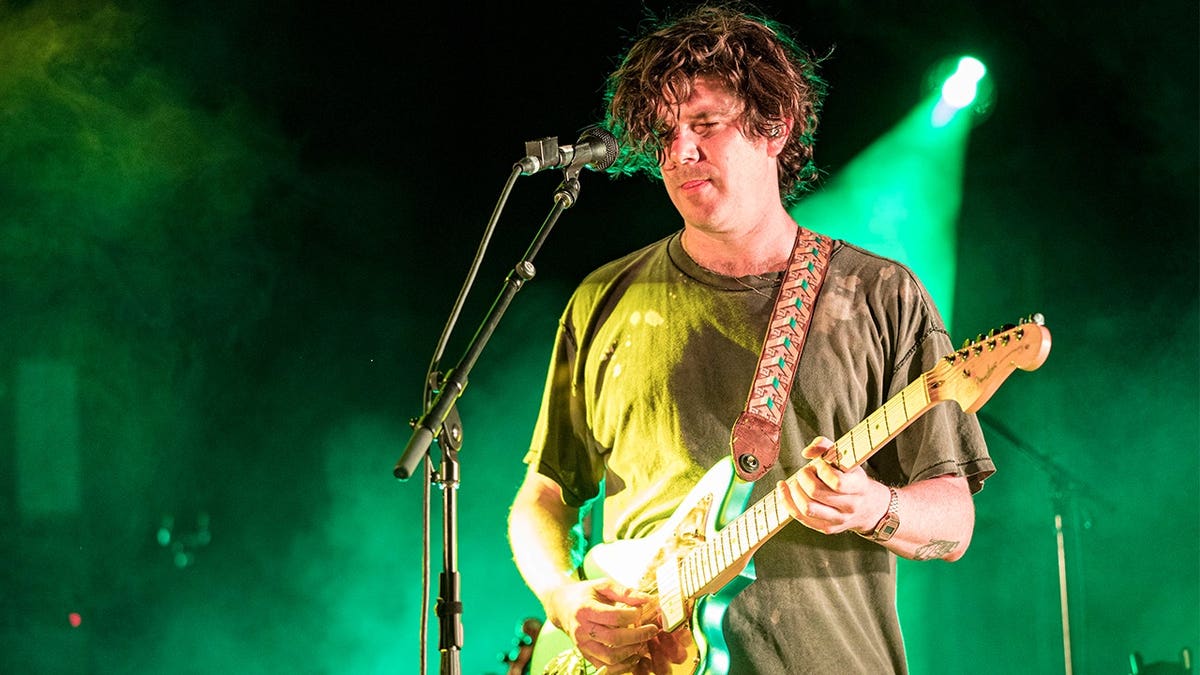 Simon O'Connor on guitar