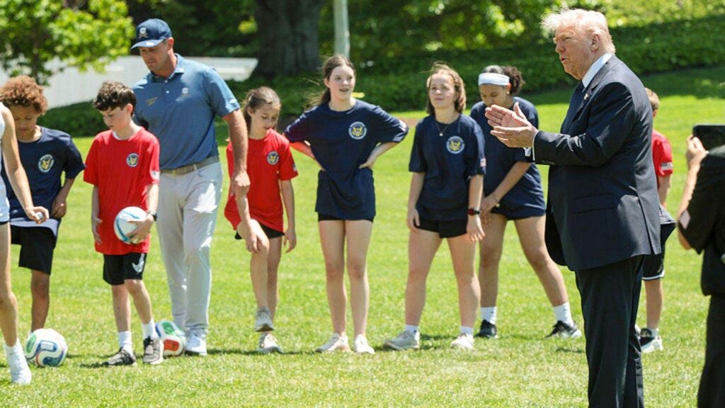 Pat McAfee attends sporting event with President Trump wearing jeans and a backwards cap Pat McAfee attends sporting event with President Trump wearing jeans and a backwards cap