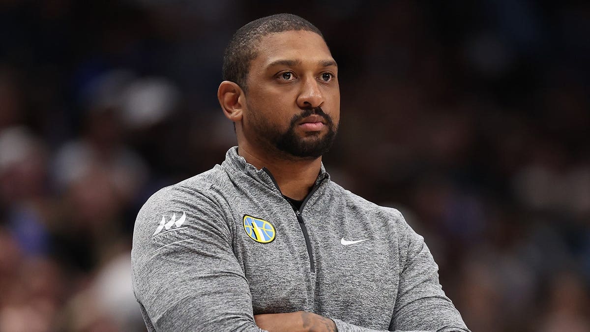 Tyler Marsh watches play during a Chicago Sky game at American Airlines Center.