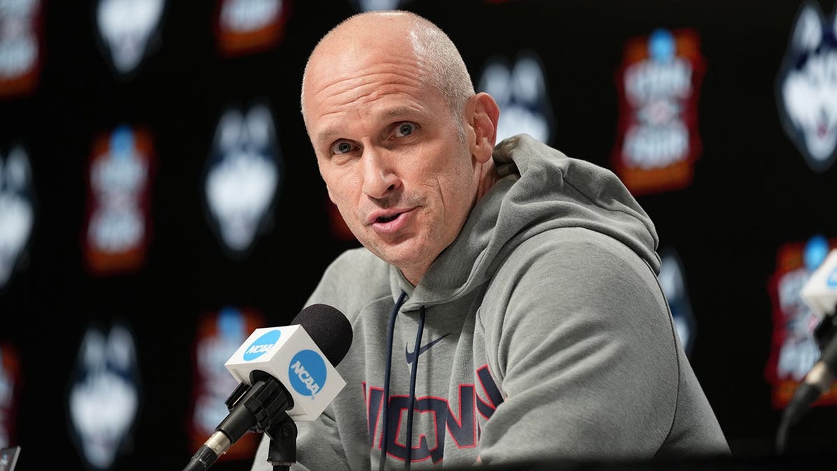 UConn head coach Dan Hurley speaking at a news conference